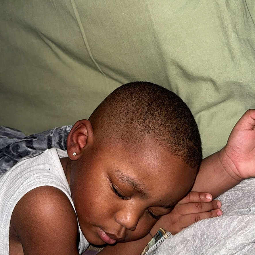 Masonyy is registered to the contest to win money with this photo: baby, bed, bodypart, boy, child, couch, cushion, electronics, face, finger, furniture, hand, head, homedecor, male, newborn, person, photography, portrait, sleeping