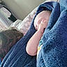 baby, infant, sleeping, portrait, blanket, blue_blanket, bed, bedroom, cozy, peaceful, resting, closed_eyes, face, arm, hand, pajamas, bedding, indoors, soft_texture, nap