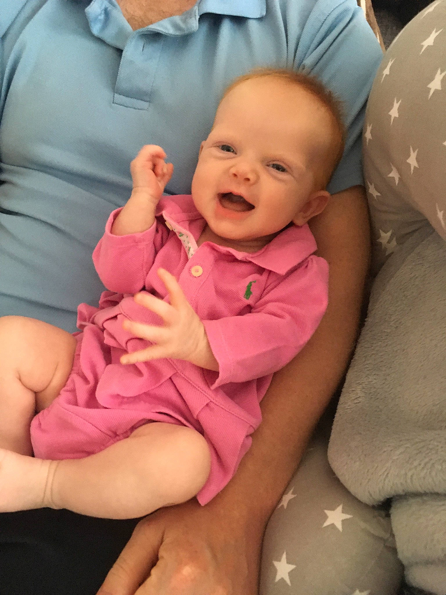 Aoife is registered to the contest to win money with this photo: baby, cheek, child, finger, leg, person, pink, sitting, skin, toddler