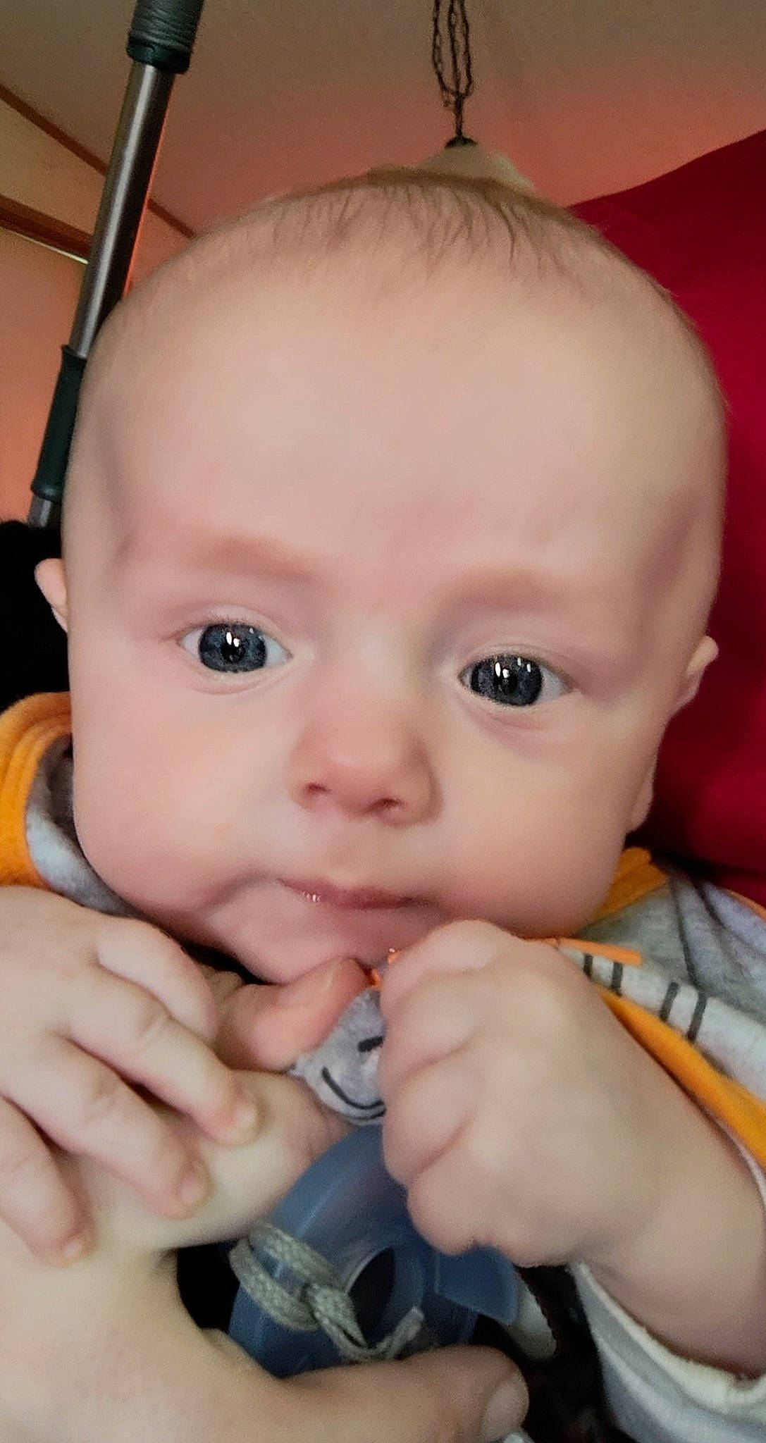 Jackson is registered to the contest to win money with this photo: baby, cheek, chin, ear, eye, eyebrow, eyelash, finger, forehead, gesture, hand, happy, head, iris, lip, mouth, neck, nose, person, skin