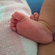 Candace is registered to the contest to win money with this photo: baby, baby_foot, blanket, child, close_up, comfort, cute, detail, foot, infant, newborn, pastel_colors, relaxation, resting, skin, sleeping, small, soft_texture, toes, warmth