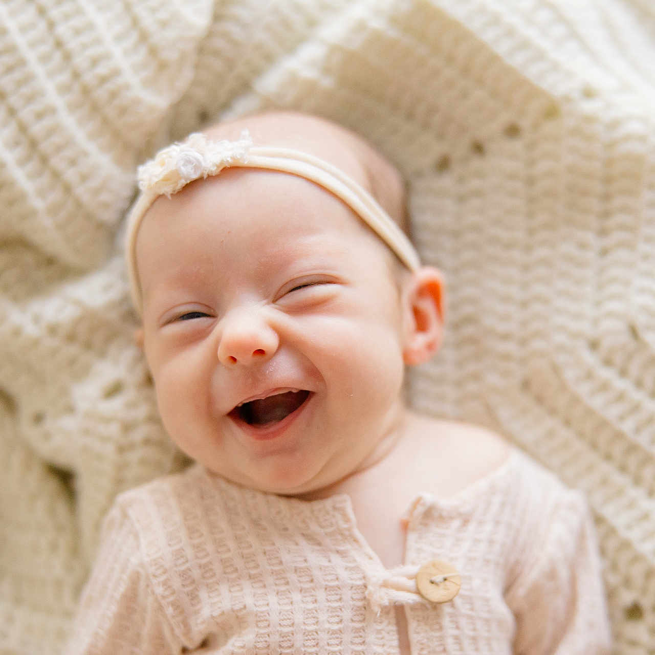 Tillie is registered to the contest to win money with this photo: baby, babylaughing, face, happy, head, laughing, newborn, person, photography, portrait, smile