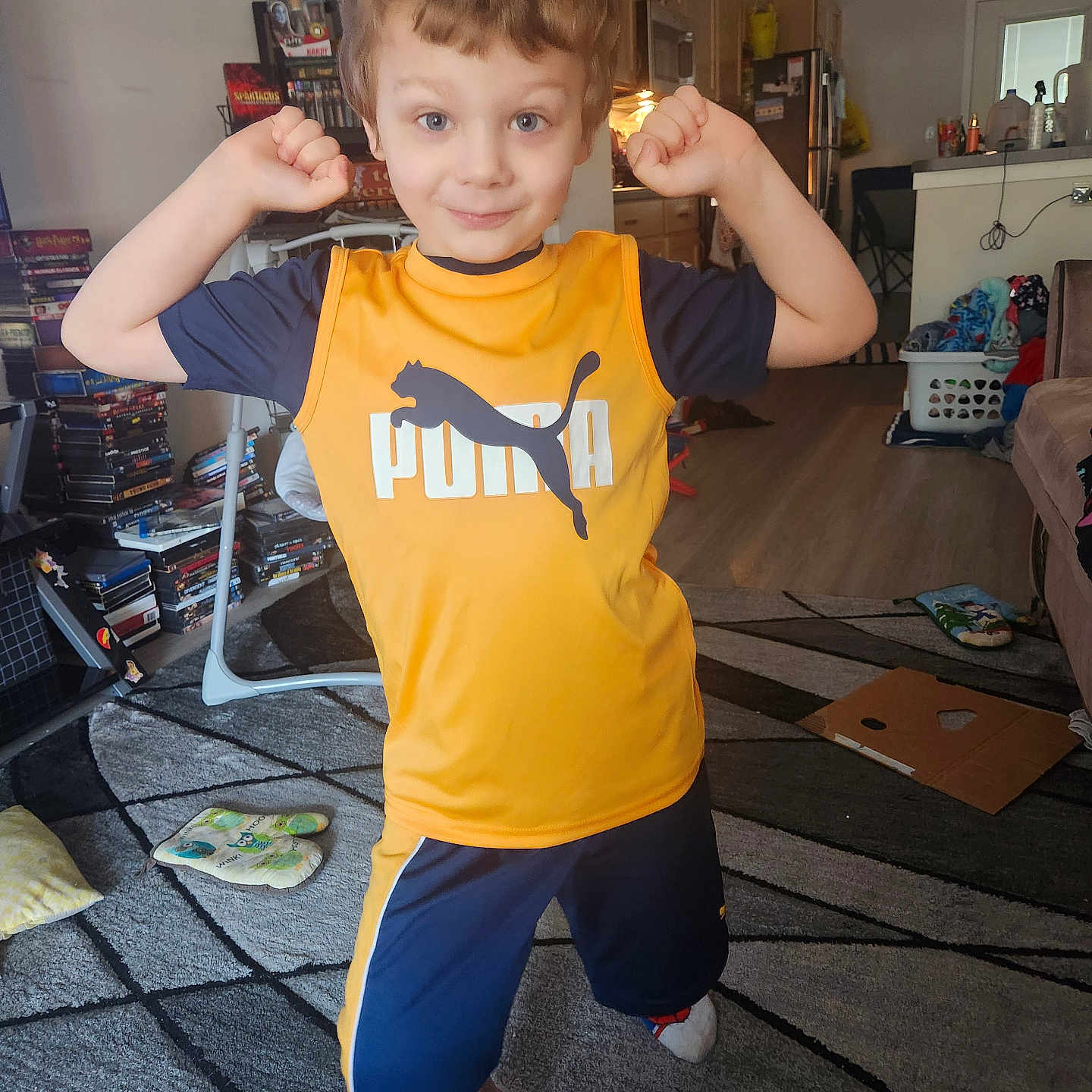 Damon joined the competition — help win amazing prizes! bodypart, boy, chair, child, clothing, cutlery, face, finger, footwear, furniture, hand, head, male, person, photography, portrait, shoe, shorts, t_shirt, wood