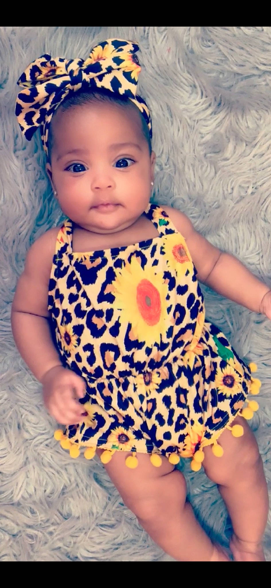 Kenya is registered to the contest to win money with this photo: baby, baby_bloomers, baby_products, baby_toddler_clothing, child, child_model, clothing, design, dress, fashion_accessory, hair_accessory, headband, headgear, pattern, person, product, toddler