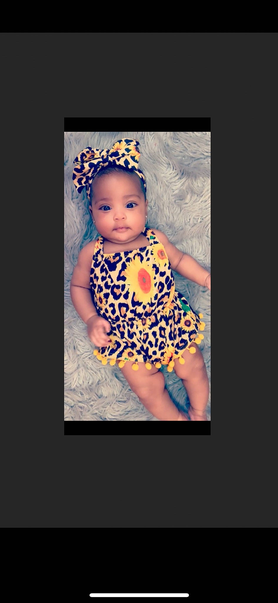 Kenya is registered to the contest to win money with this photo: art, baby, baby_products, baby_toddler_clothing, child, child_model, design, dress, headgear, pattern, person, photo_caption, photograph, photography, portrait, product, toddler, yellow