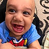 Jalal Ghazi Karrar is registered to the contest to win money with this photo: arm, baby, blanket, blue_shirt, carpet, child, closeup, cute, expression, eyes, face, happy, indoor, infant, joy, mouth, person, portrait, skin, smiling