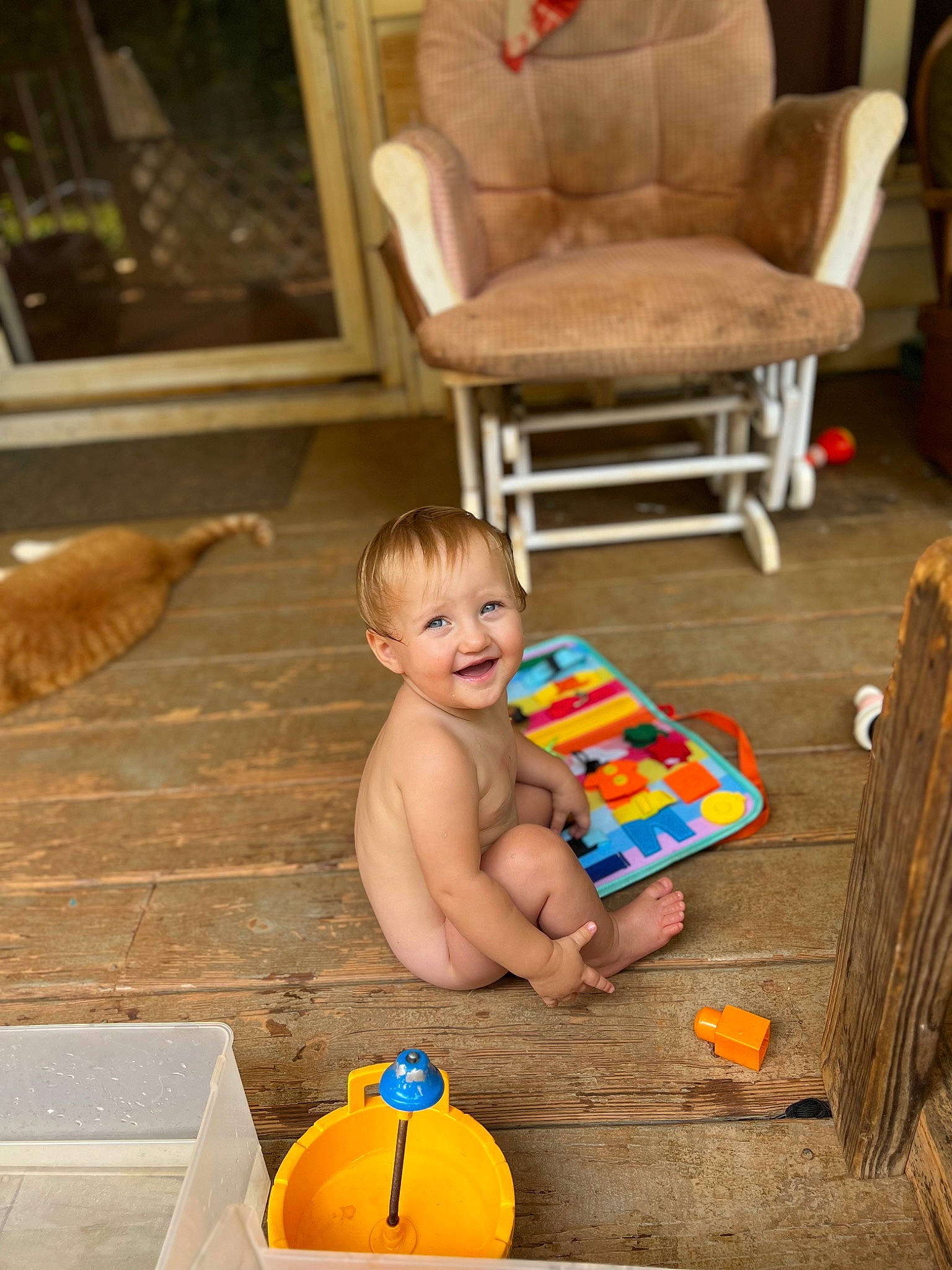 Rosalie joined the competition — help win amazing prizes! baby, bathing, chair, child, comfort, flooring, fun, happy, hardwood, joy, leisure, orange, person, play, room, sitting, smile, summer, toddler, toy
