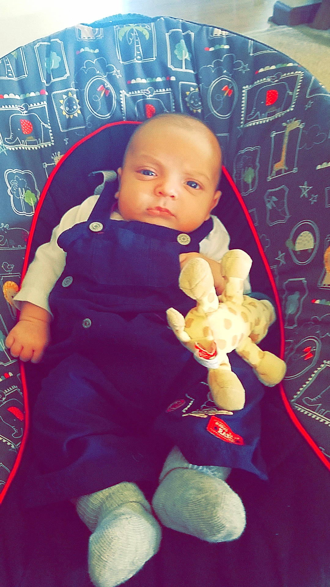 Justin is registered to the contest to win money with this photo: baby, baby_products, baby_toys, child, doll, person, plush, stuffed_toy, toddler, toy