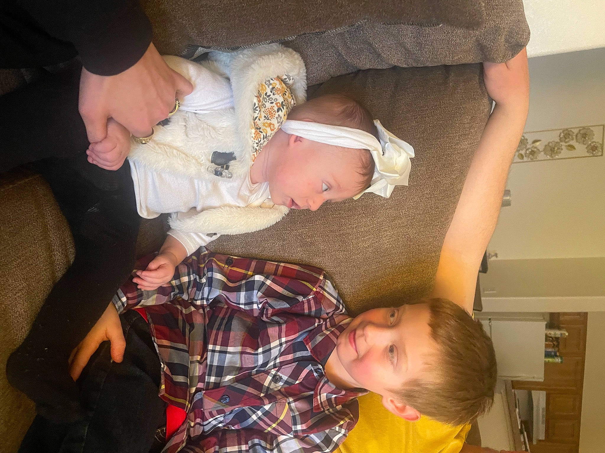 Colette joined the competition — help win amazing prizes! abdomen, baby, baby_products, baby_toddler_clothing, cheek, child, event, fun, gesture, happy, hat, joy, lap, pattern, person, plaid, room, sitting, tartan, thigh