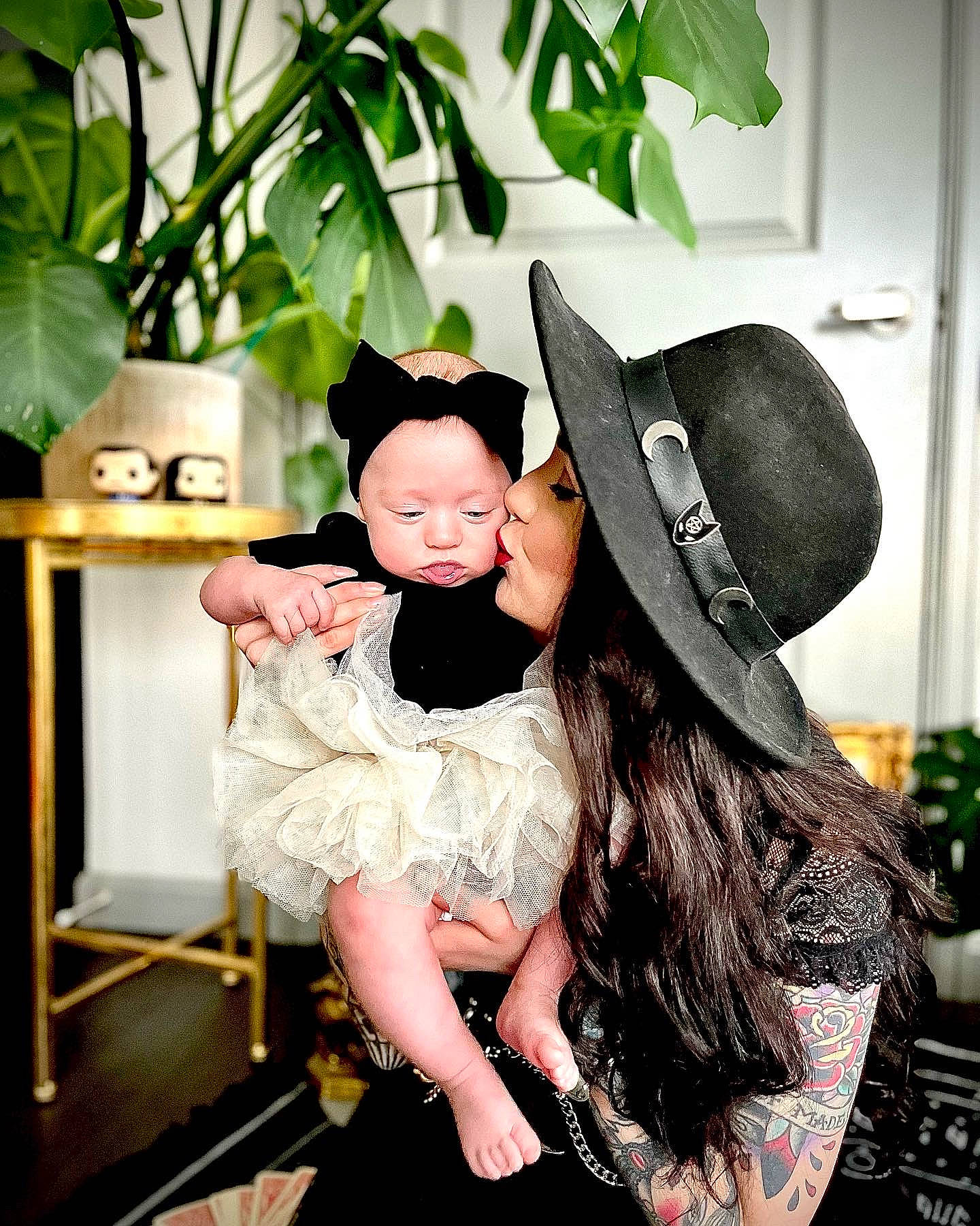 Colette is registered to the contest to win money with this photo: black_hair, cap, child, dress, event, eyewear, fashion_accessory, fashion_design, flash_photography, formal_wear, fun, happy, hat, headpiece, headwear, jewellery, leisure, person, romance, sitting