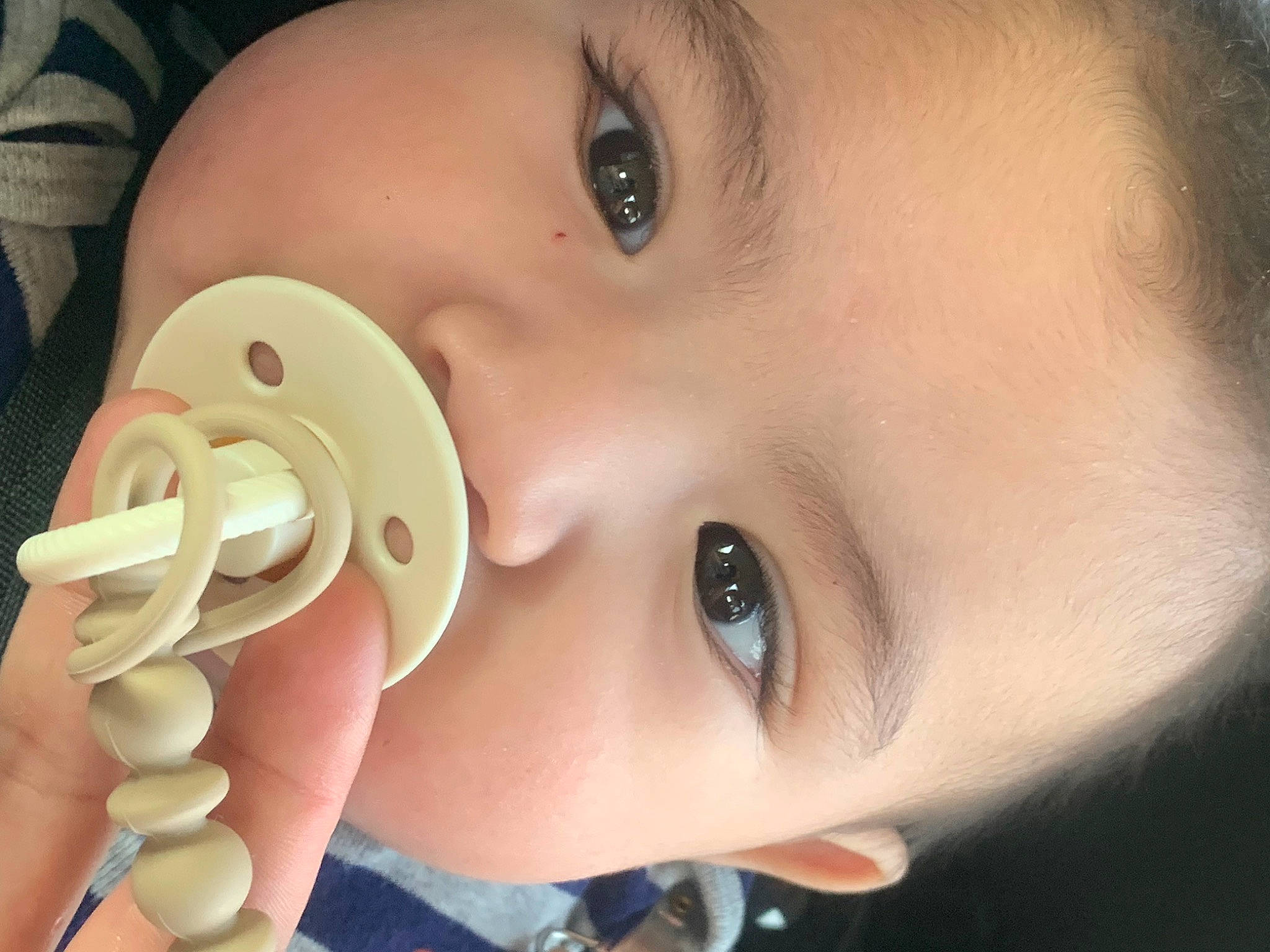 Adriel is registered to the contest to win money with this photo: baby, cheek, child, chin, ear, eyebrow, eyelash, facial_expression, finger, forehead, human_body, iris, jaw, lip, mouth, nail, neck, nose, person, skin