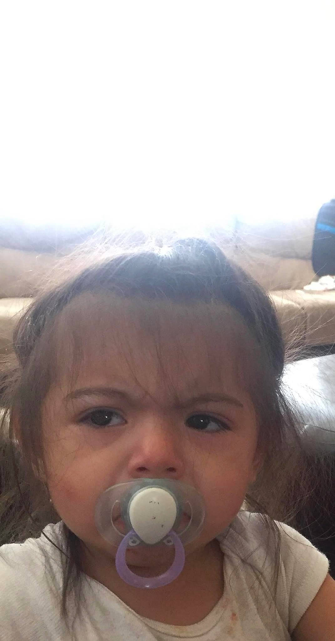 Aadyson is registered to the contest to win money with this photo: child, drinking, face, mouth, nose, person, selfie