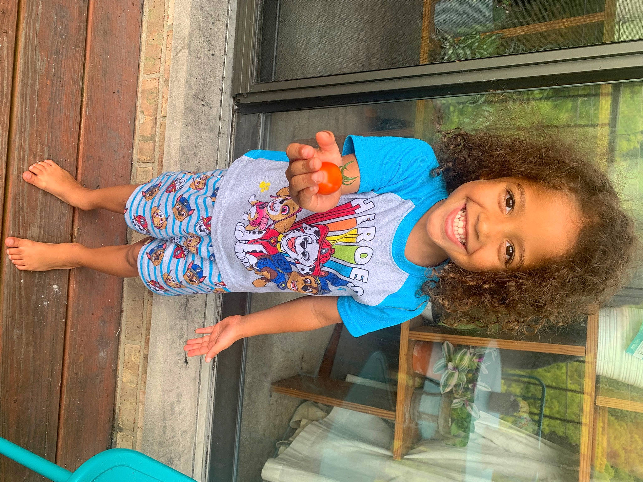 Neiko is registered to the contest to win money with this photo: barefoot, blue, child, cool, electric_blue, facial_expression, flip_flops, fun, happy, human_leg, joy, leisure, person, play, shorts, smile, t_shirt, thigh, toddler, travel