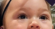 Kyndall joined the competition — help win amazing prizes! adorable, baby, child, close_up, curious_expression, cute, eyes, face, headband, headwear, indoor, infant, mouth_open, person, pink_clothing, portrait, purple_bow, skin, soft_lighting, young_child