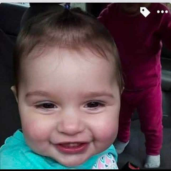 Chevelle Steptoe is registered to the contest to win money with this photo: child, toddler, smiling, face, indoor, clothing, person, cute, happy, baby, portrait, head, cheeks, casual, people, two_children, background, pink_outfit, turquoise_top, snapshot