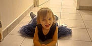 Lyana participe au concours pour gagner de l'argent avec cette photo : child, clothing, crawling, door, face, female, girl, head, hosiery, indoors, interiordesign, jeans, lighting, pants, person, photography, portrait, sitting, sock, tile