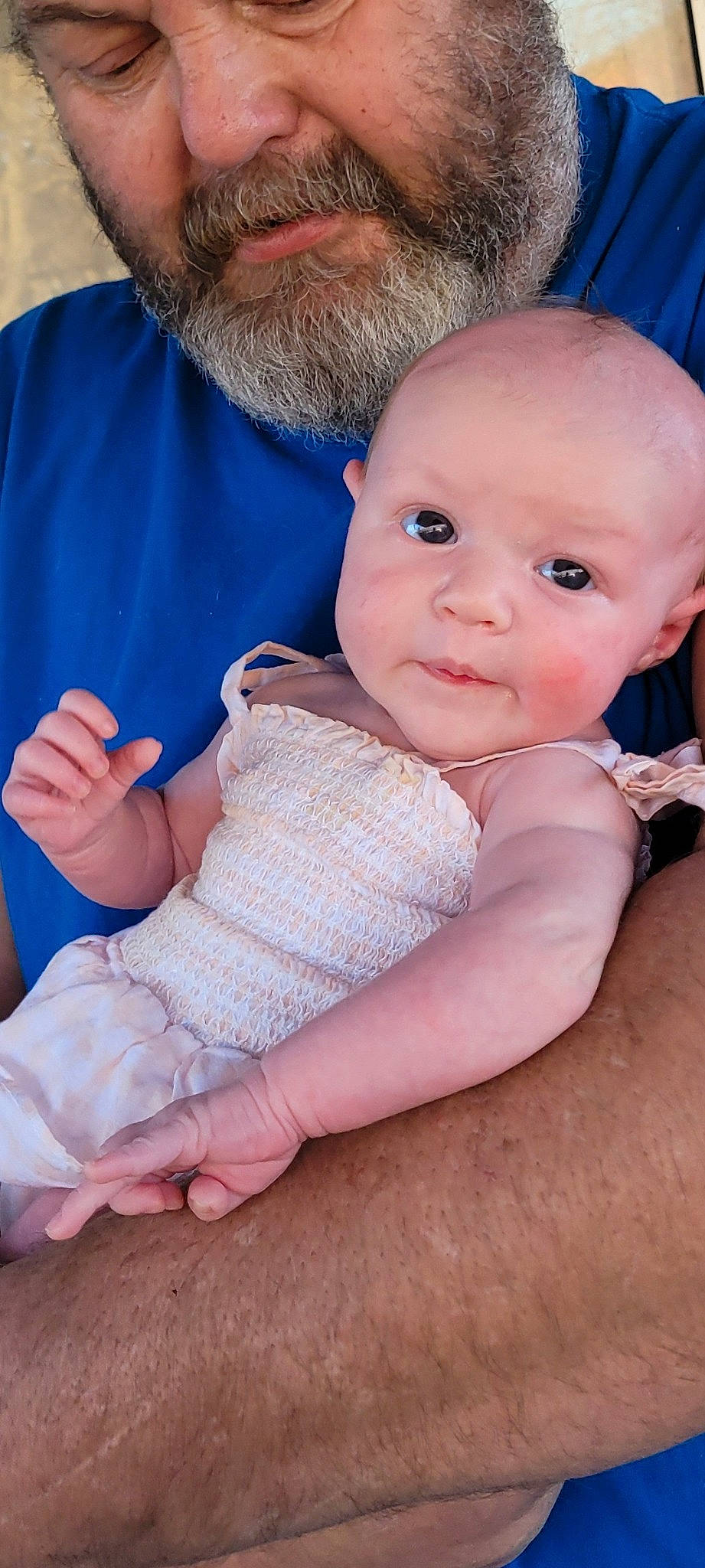 Emberlyn joined the competition — help win amazing prizes! baby, baby_toddler_clothing, beard, blue, cheek, eye, finger, gesture, hand, happy, head, headwear, human_body, interaction, iris, leg, lip, nose, person, skin