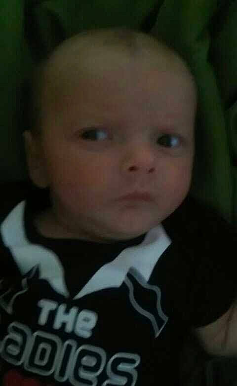 Charlie is registered to the contest to win money with this photo: baby, baby_toddler_clothing, cheek, child, ear, eyebrow, eyelash, flash_photography, forehead, fun, happy, iris, jaw, mouth, nose, person, photo_caption, portrait_photography, sleeve, t_shirt