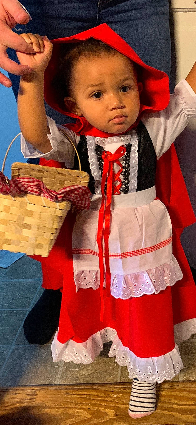 Kya is registered to the contest to win money with this photo: baby_toddler_clothing, basket, bow_tie, child, collar, embellishment, event, fashion_accessory, fun, happy, pattern, person, photograph, picnic_basket, red, sleeve, snapshot, storage_basket, toddler, vest