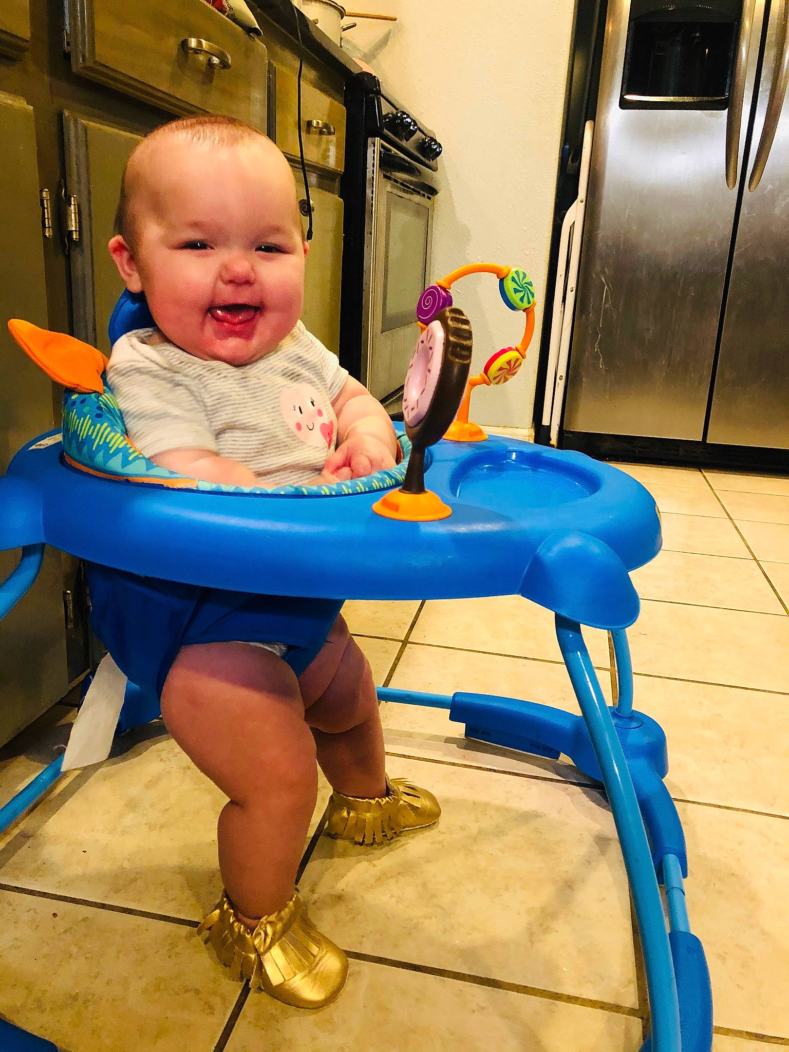 Taylor is registered to the contest to win money with this photo: baby, chair, child, person, play, sitting, toddler