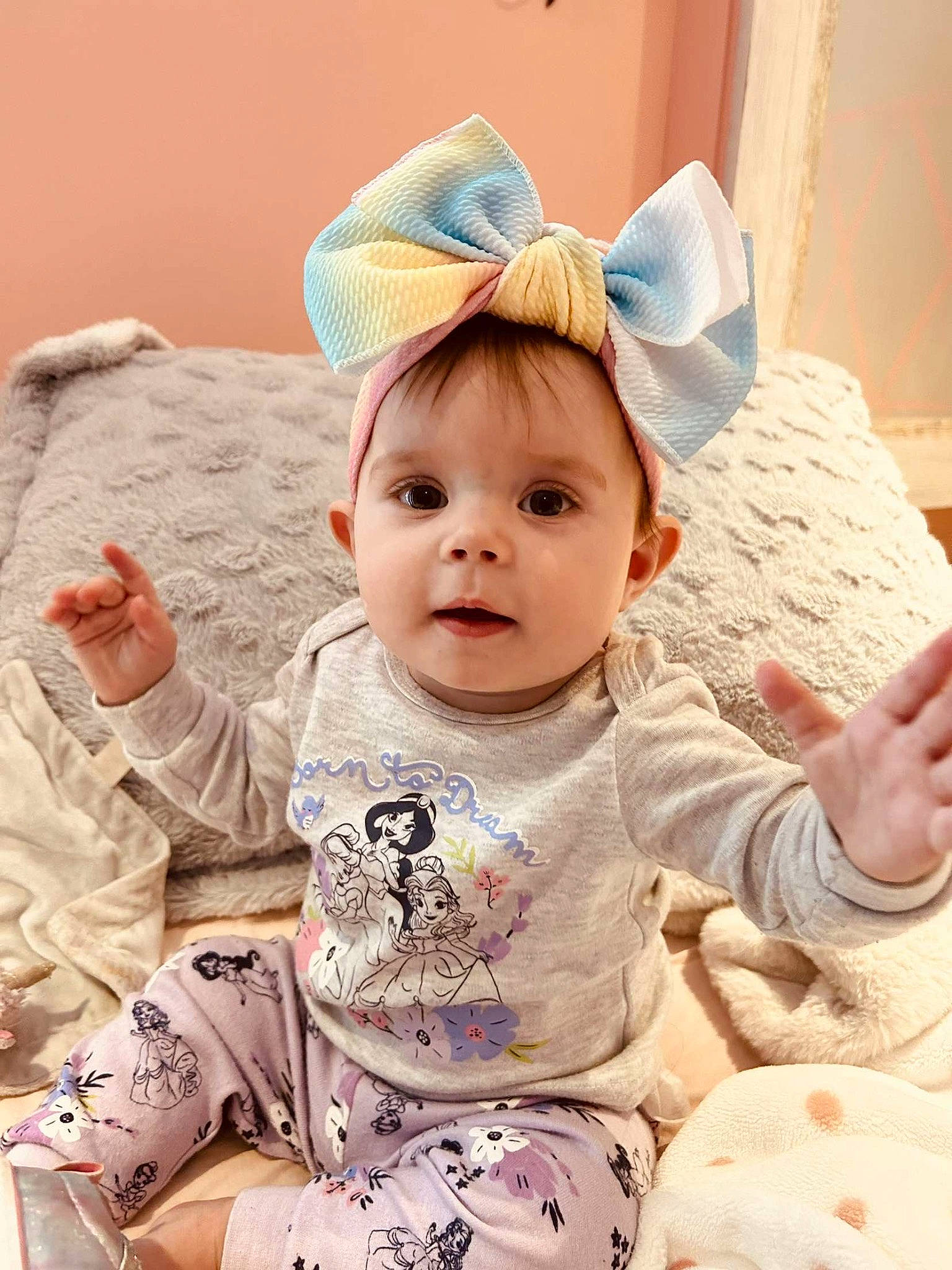 Legacy is registered to the contest to win money with this photo: baby, baby_toddler_clothing, cap, cheek, child, chin, comfort, ear, eye, face, happy, head, headgear, human_body, person, pink, skin, sleeve, smile, toddler