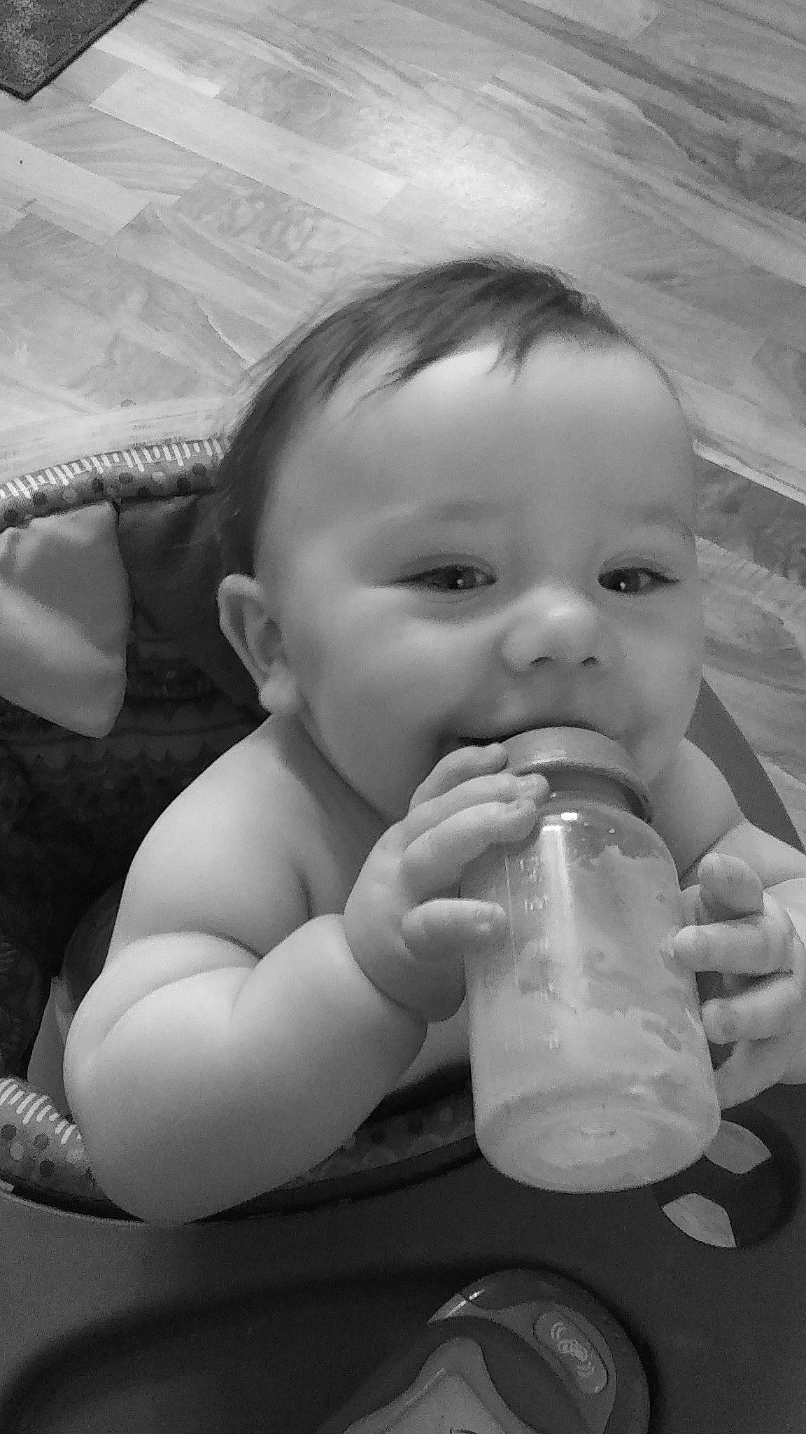 Johnathon joined the competition — help win amazing prizes! arm, baby, baby_bottle, black, black_and_white, bottle, cheek, cloud, drinkware, finger, gesture, hairstyle, hand, human_body, iris, mouth, nose, person, plastic_bottle, skin