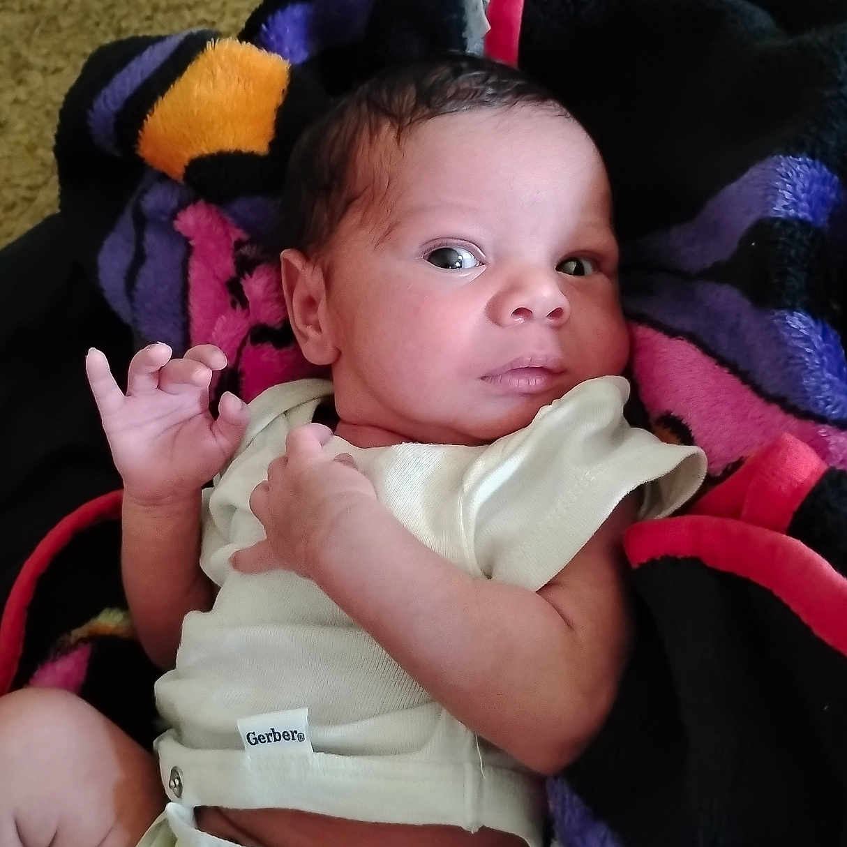 Rah-Keem joined the competition — help win amazing prizes! baby, blanket, child, clothing, cute, diaper, expression, face, head, human, indoors, infant, looking, lying_down, newborn, person, skin, small, soft, wrapped