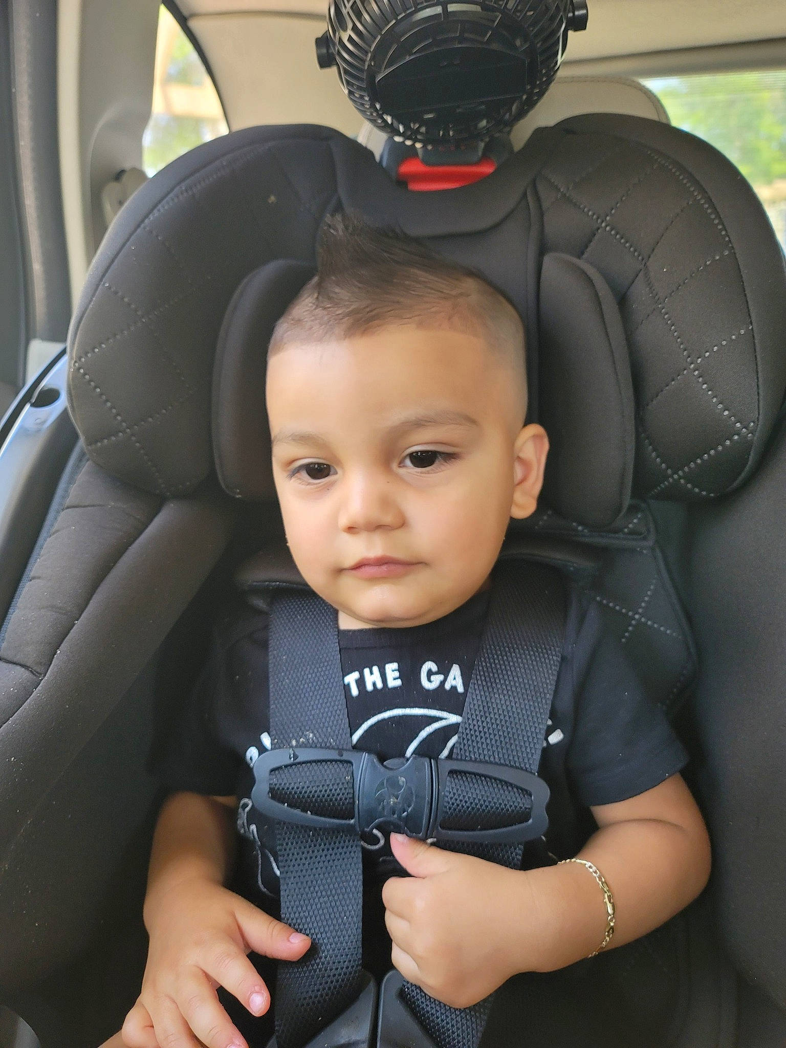 Mikey joined the competition — help win amazing prizes! auto_part, automotive_design, baby, baby_carriage, baby_toddler_clothing, beauty, black, black_hair, car_seat, car_seat_cover, comfort, cool, eye, eyebrow, flash_photography, head_restraint, person, product, seat_belt, toddler