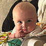 Cohen joined the competition — help win amazing prizes! baby, child, infant, face, finger, eyes, cheeks, clothing, seat, toy, cushion, sofa, indoor, portrait, cute, expression, skin, hand, closeup, young