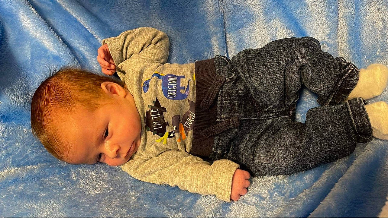 Elijah is registered to the contest to win money with this photo: baby, baby_sleeping, baby_toddler_clothing, bedtime, cheek, child, comfort, fur, linens, nap, person, room, sitting, sleep, sleeve, textile, toddler, wood