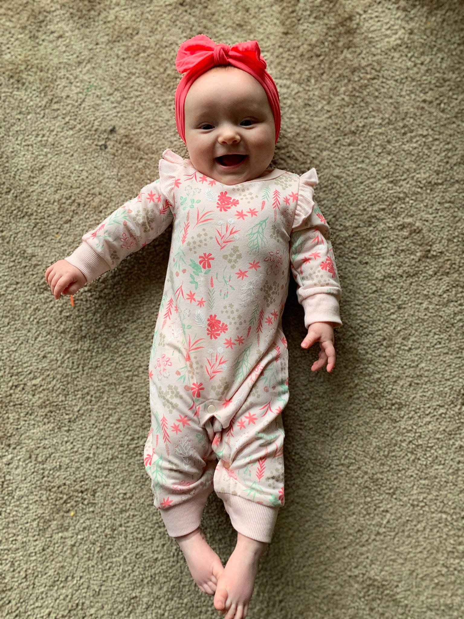 Mackenna is registered to the contest to win money with this photo: arm, baby, baby_toddler_clothing, child, face, facial_expression, finger, fun, gesture, happy, head, leg, outerwear, pattern, people, people_in_nature, person, skin, sleeve, smile