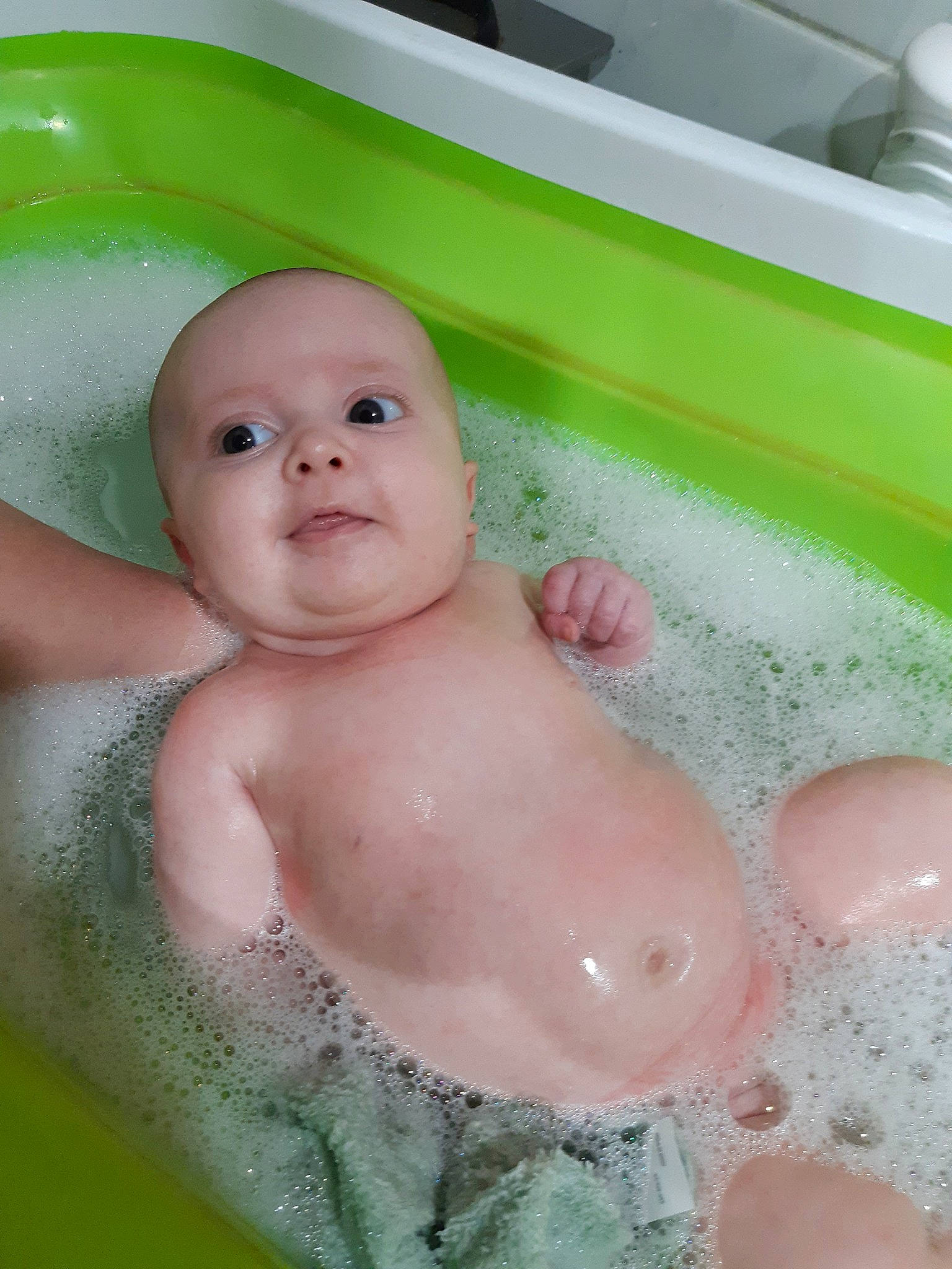 Kensleigh joined the competition — help win amazing prizes! baby, baby_bathing, baby_products, bathing, bathtub, child, face, person, product, skin, smile, stomach, toddler, washing