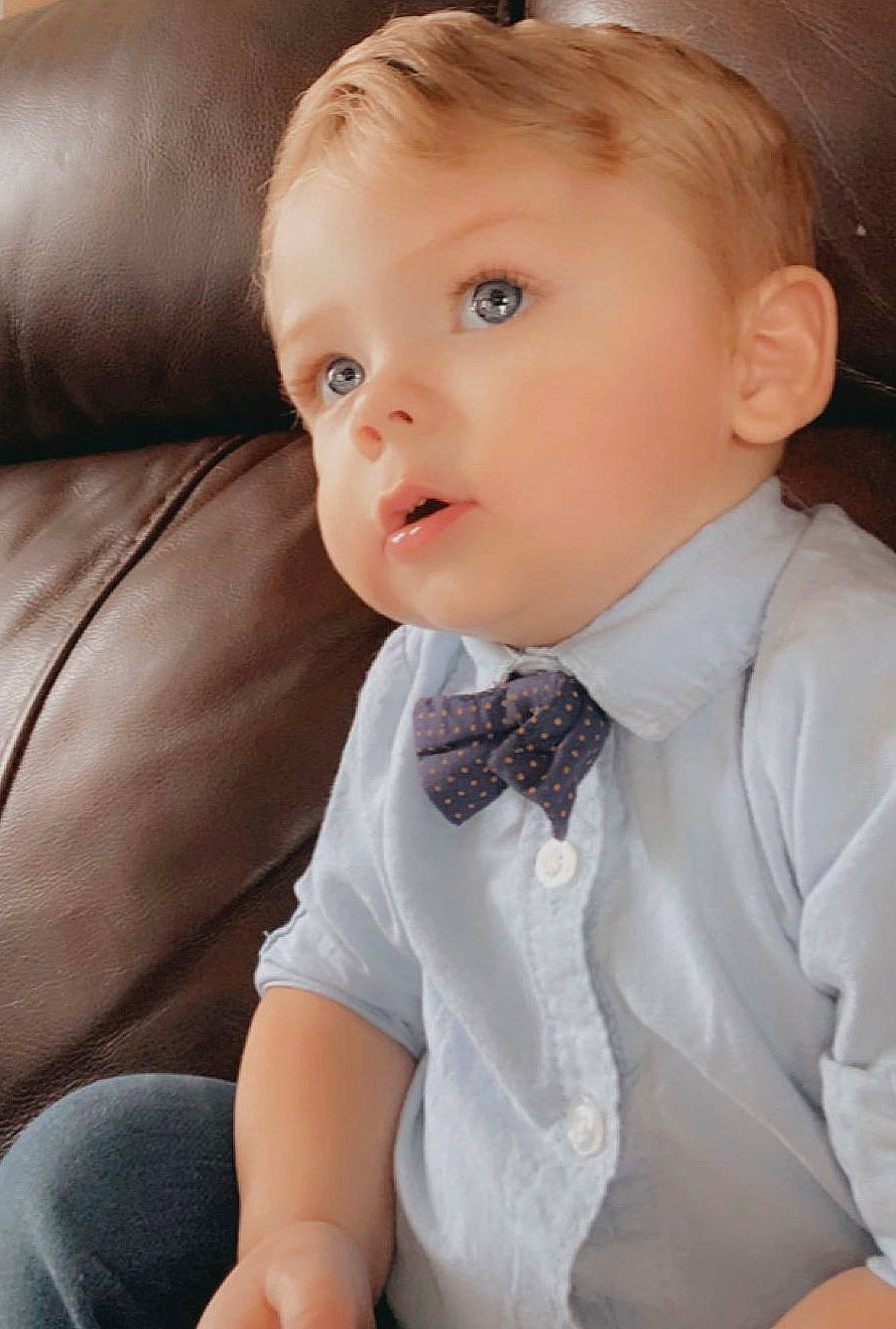 Jaxyn is registered to the contest to win money with this photo: baby, bow_tie, cheek, child, child_model, chin, face, formal_wear, lip, nose, person, skin, suit, tie, toddler, tuxedo