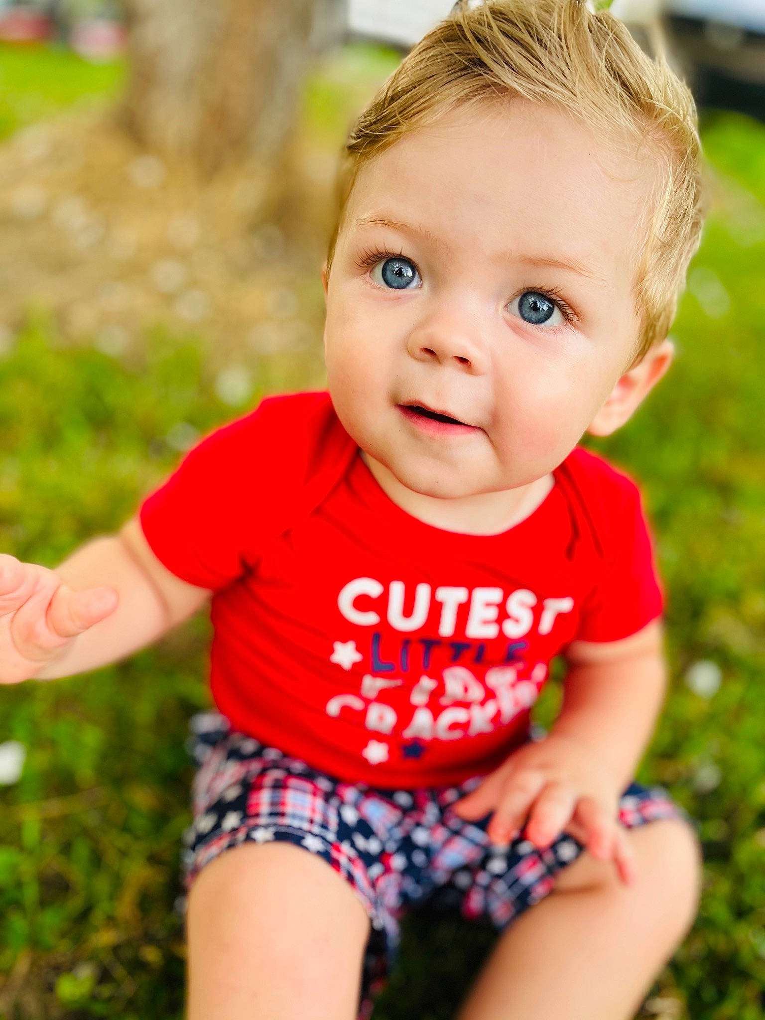 Jaxyn is registered to the contest to win money with this photo: baby, baby_products, baby_toddler_clothing, blond, child, child_model, grass, happy, person, photography, pink, plant, play, portrait, portrait_photography, product, skin, smile, summer, t_shirt