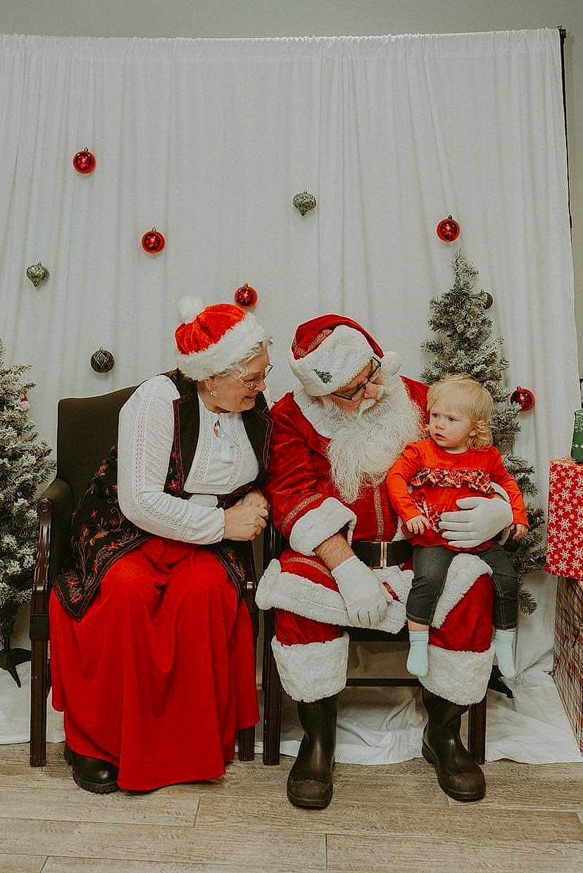 Haisleigh joined the competition — help win amazing prizes! christmas, christmas_ornament, christmas_tree, costume, costume_hat, curtain, event, fictional_character, fun, fur, happy, hat, holiday, person, plant, room, santa_claus, toddler, tradition, tree