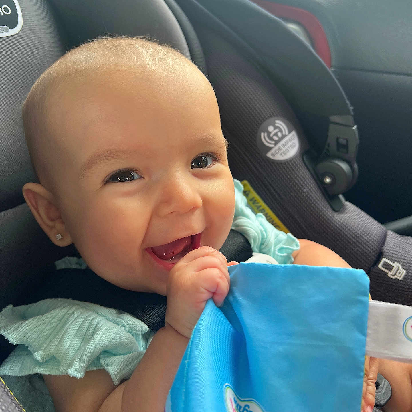 Ivy joined the competition — help win amazing prizes! accessories, baby, babylaughing, car, car_interior, carseat, clothing, cushion, dress, face, happy, head, homedecor, laughing, person, photography, portrait, smile, transportation, vehicle
