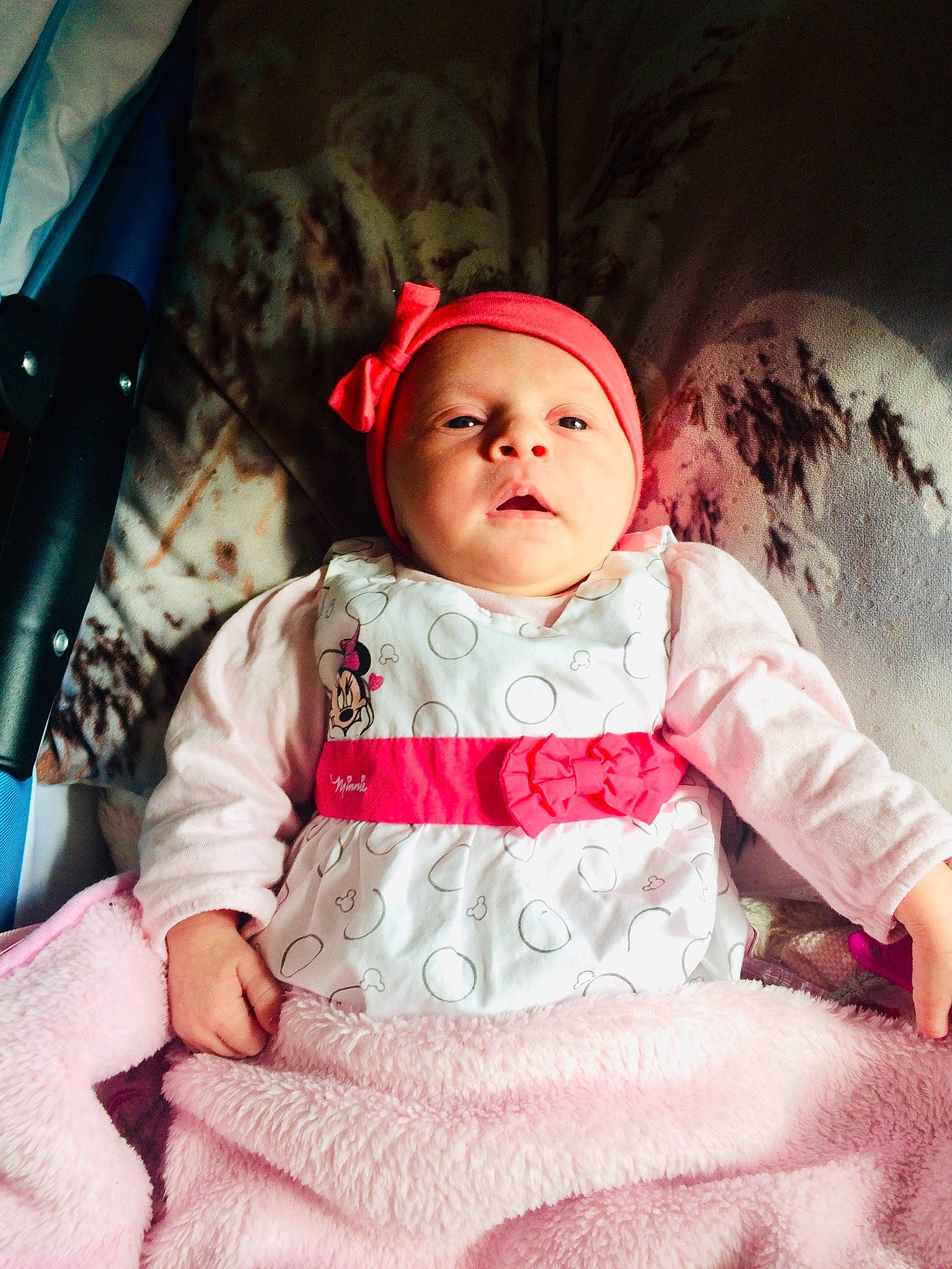 Kaissy participe au concours pour gagner de l'argent avec cette photo : baby, baby_products, cheek, child, dress, eye, headgear, headwear, person, pink, product, sitting, skin, smile, toddler