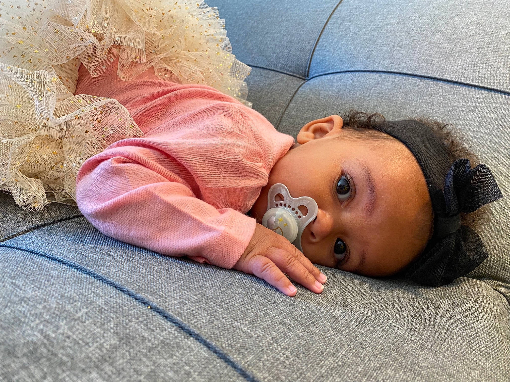 Akeelah is registered to the contest to win money with this photo: baby, baby_sleeping, bedding, child, comfort, eye, flooring, fur, grass, happy, headgear, linens, mammal, nose, person, skin, tints_and_shades, toddler, vehicle_door, vertebrate