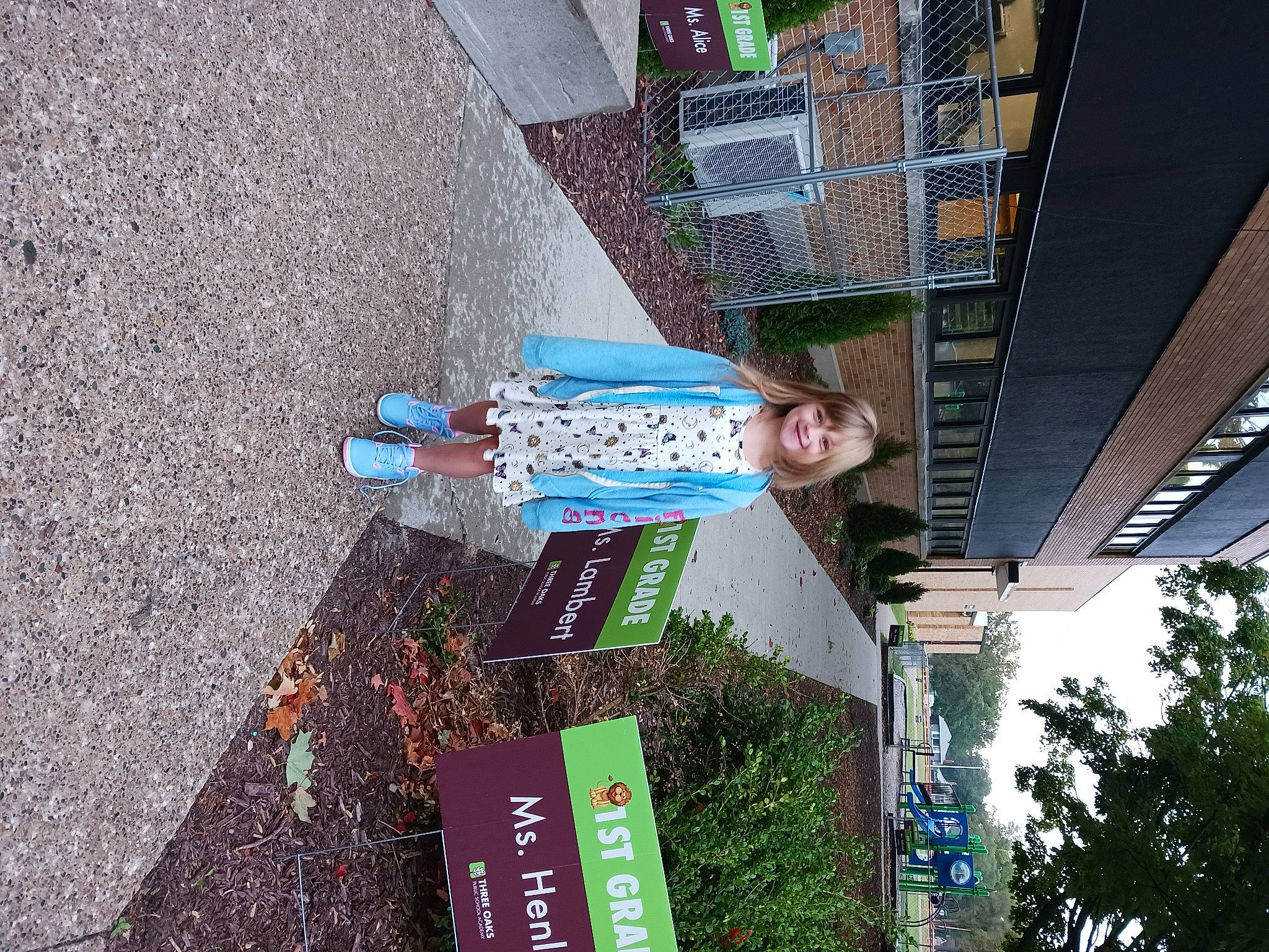 Sophia joined the competition — help win amazing prizes! advertising, apartment, asphalt, building, city, concrete, facade, fun, joy, leisure, line, mixed_use, person, plant, sidewalk, smile, soil, tree, urban_design