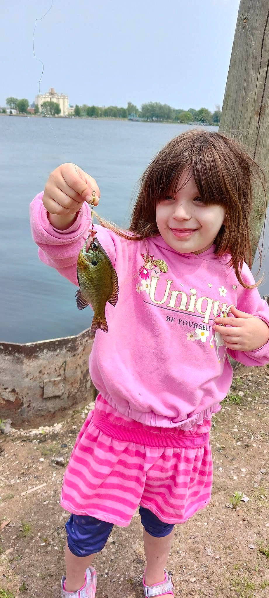 Isabella joined the competition — help win amazing prizes! baby_toddler_clothing, child, fish, fun, grass, happy, joy, lake, magenta, people_in_nature, person, pink, recreation, sky, sleeve, smile, soil, thumb, toddler, travel