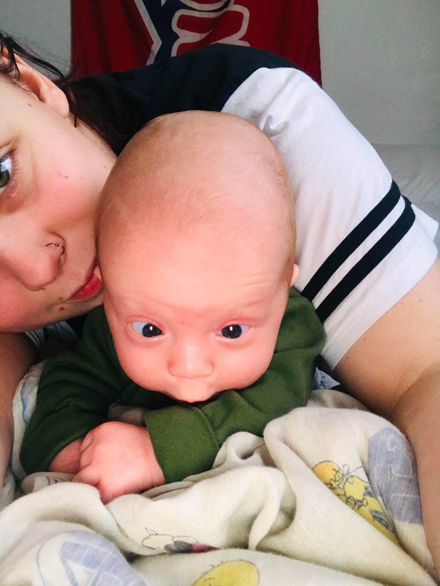 Zayden is registered to the contest to win money with this photo: baby, baby_products, cheek, child, comfort, finger, fun, gesture, happy, linens, mouth, nose, organ, person, product, sitting, skin, stuffed_toy, thumb, toddler