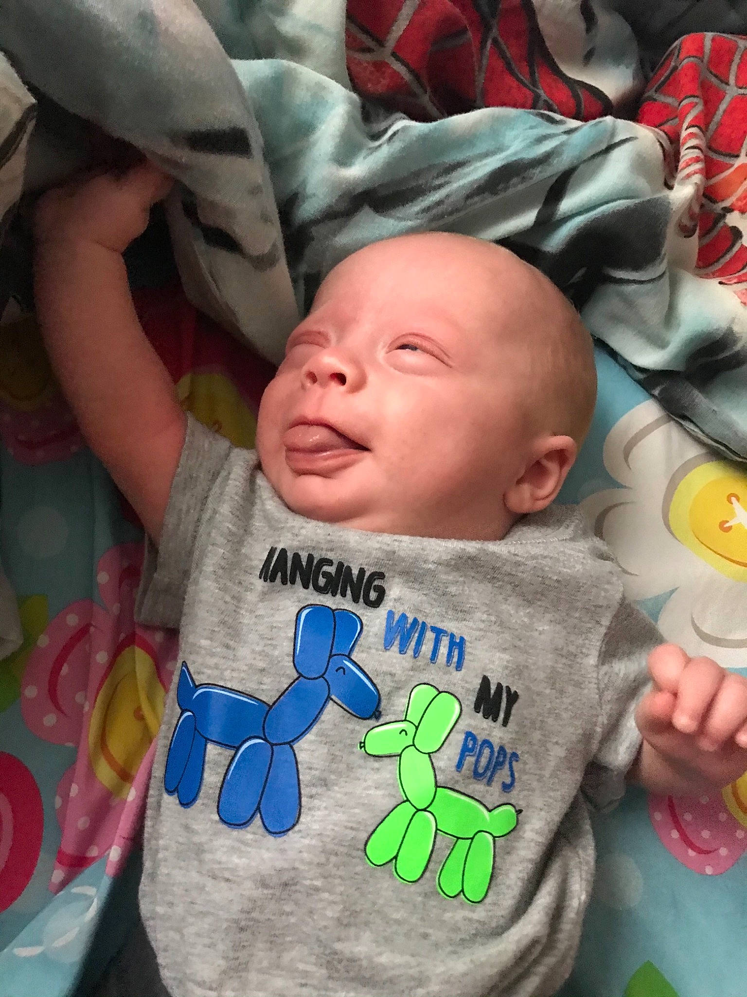 Zayden is registered to the contest to win money with this photo: baby, baby_toddler_clothing, cheek, comfort, cool, facial_expression, finger, forehead, happy, human, mammal, mouth, people, person, pink, product, skin, sleeve, textile, toddler