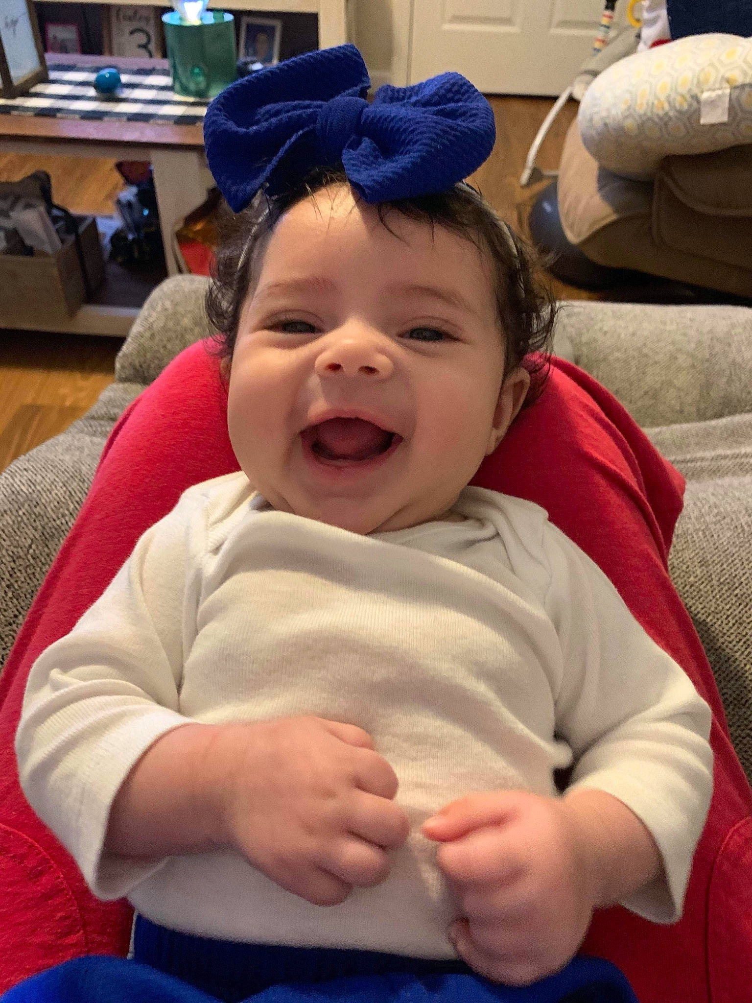 Dani is registered to the contest to win money with this photo: baby, baby_toddler_clothing, blue, cap, cheek, child, chin, comfort, eye, finger, fun, gesture, happy, lap, mouth, nose, person, skin, smile, thumb