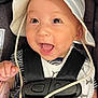 baby, baby_bib, car_seat, child, closeup, clothing, cute, eyes, happy, hat, headwear, infant, infant_clothing, joy, mouth_open, person, safety, seatbelt, smile, straps