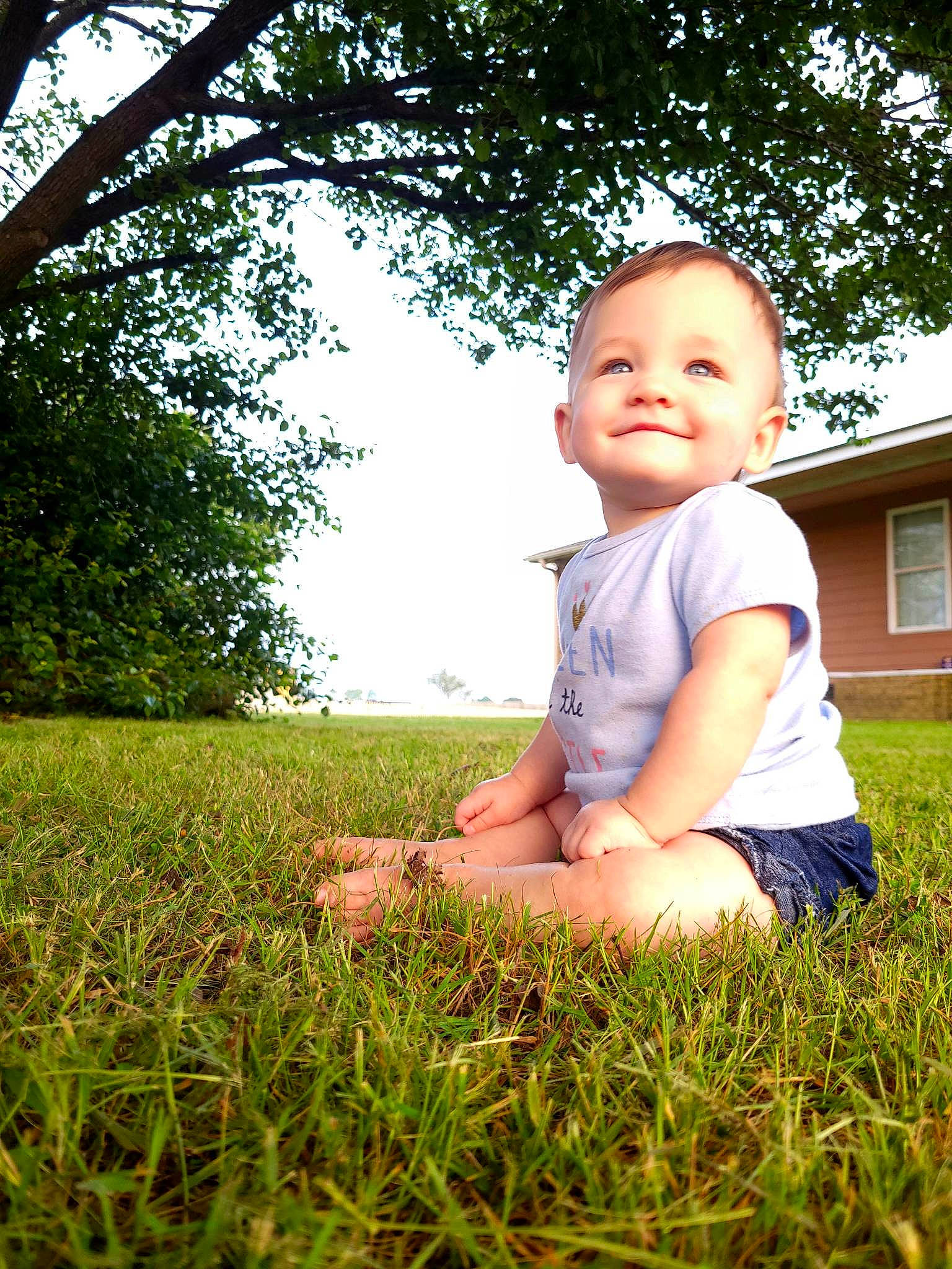 Emberlyn is registered to the contest to win money with this photo: baby, baby_toddler_clothing, flash_photography, fun, grass, grass_family, grassland, happy, joy, lawn, leaf, leisure, meadow, people_in_nature, person, plant, sky, smile, sunlight, toddler