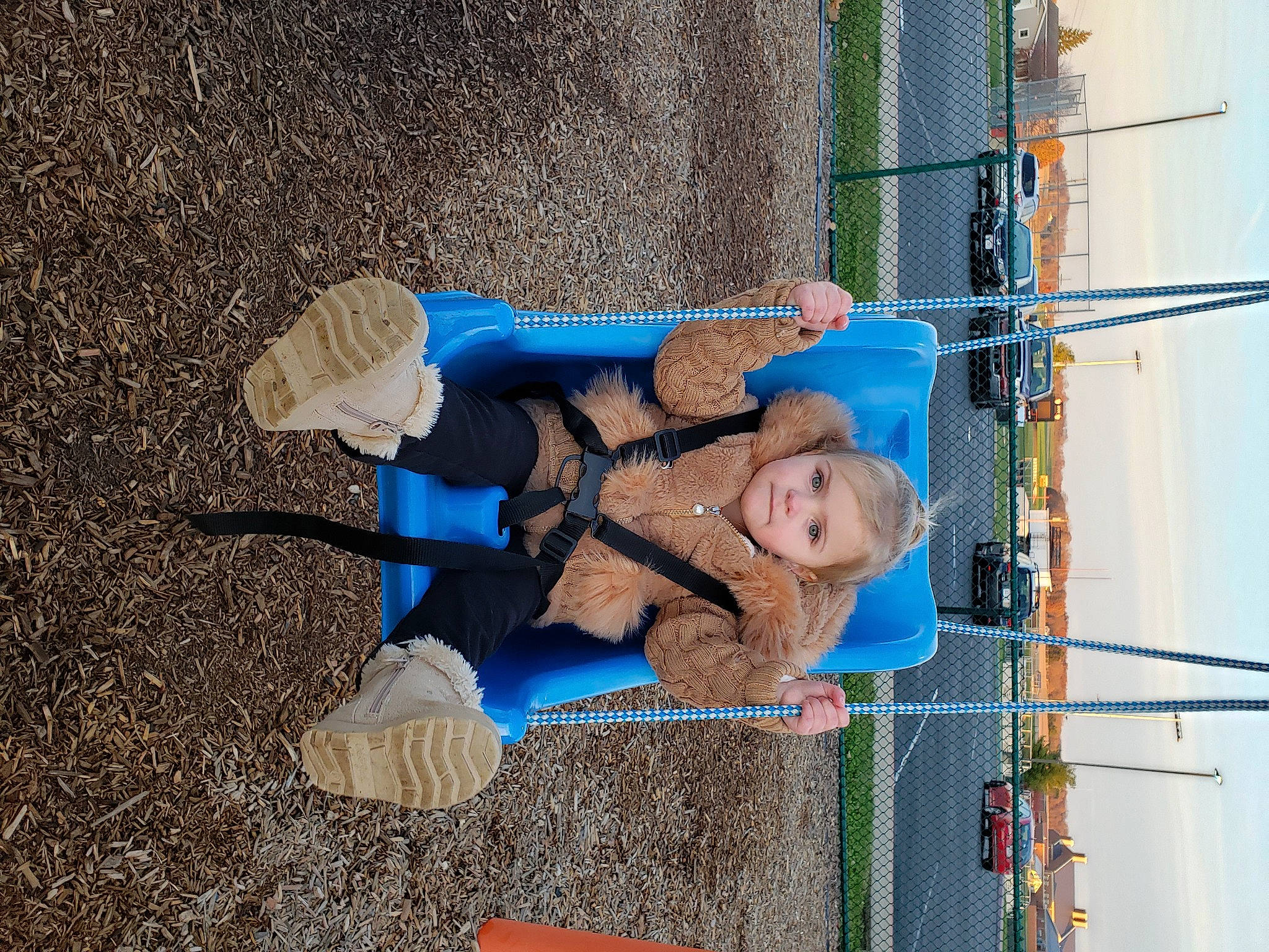 Kaia joined the competition — help win amazing prizes! azure, baby, baby_toddler_clothing, child, city, concrete, electric_blue, fun, leisure, outdoor_play_equipment, person, play, playground, recreation, shadow, sky, smile, soil, toddler