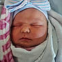 Acelynn is registered to the contest to win money with this photo: newborn, baby, sleeping, blanket, hat, bow, striped, soft, closeup, face, infant, cute, peaceful, wrapped, cozy, child, portrait, indoors, skin, resting
