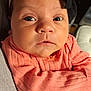 Xylena joined the competition — help win amazing prizes! baby, infant, face, headband, clothing, peach, ribbed, closeup, expression, curious, wide_eyes, skin, person, newborn, child, cute, indoors, holding, portrait, apparel
