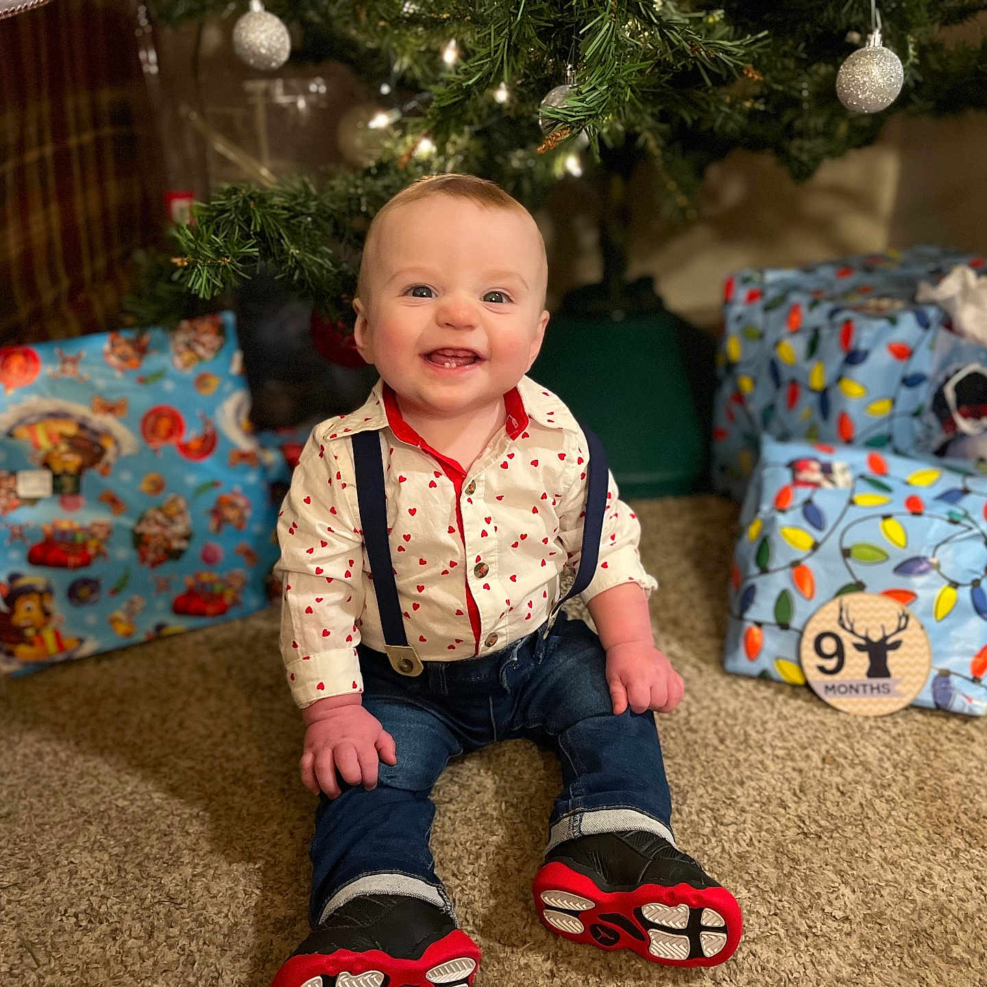 Braydon joined the competition — help win amazing prizes! architecture, baby, clothing, couch, cushion, face, footwear, furniture, head, homedecor, jeans, pants, person, photography, plant, portrait, pottedplant, shoe, sitting, tree