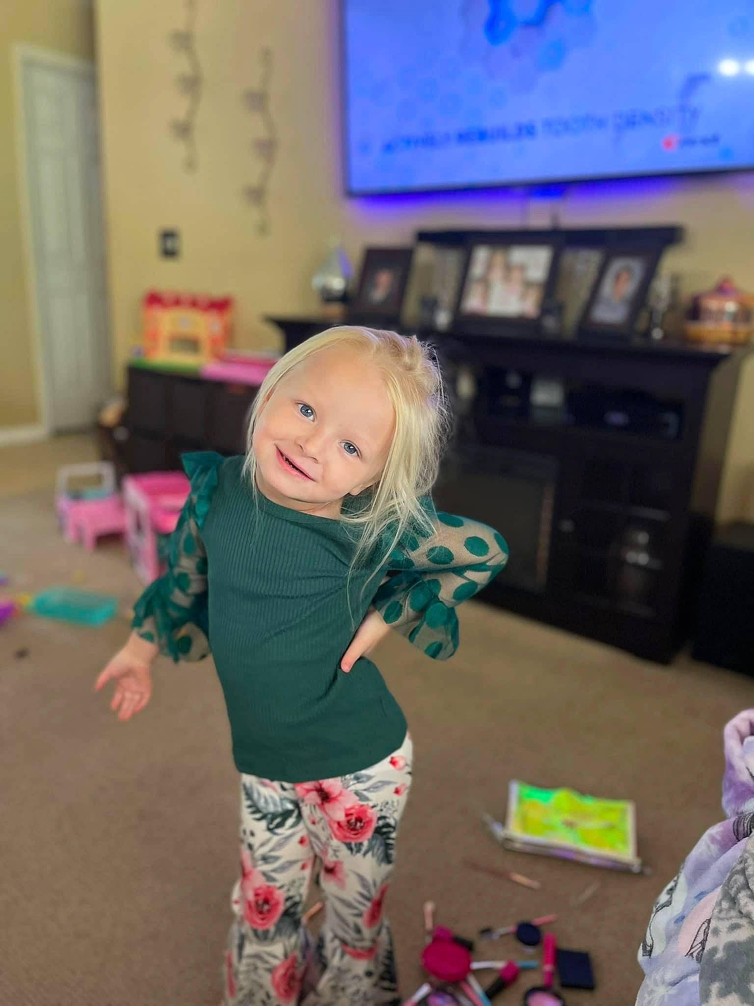 Layla is registered to the contest to win money with this photo: child, community, event, flooring, fun, happy, home_appliance, joy, leisure, magenta, party, person, picture_frame, play, recreation, room, smile, standing, t_shirt, television